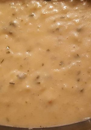 A picture of Potato cauliflower and cheese soup .