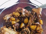A picture of chicken adobo with potatoes