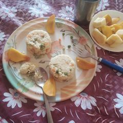 Mix vegetable upma with fruits A picture of Mix vegetable upma with fruits.