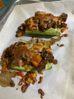 Una foto de Zucchini rellenos vegetarianos
