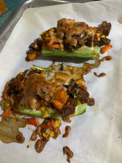 Una foto de Zucchini rellenos vegetarianos