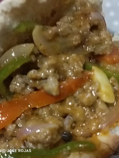 Una foto de Fajita de filete de ternera picada con pan de pita