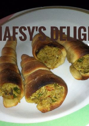 A picture of Chicken filled cones.