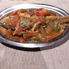 A picture of Fried Fish with Tomatoes.