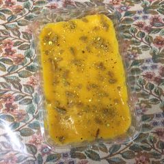A picture of Ripe mango pulp and chocolate idli.