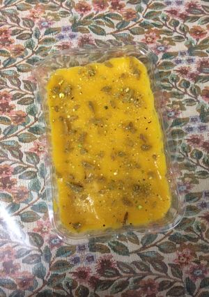 A picture of Ripe mango pulp and chocolate idli.