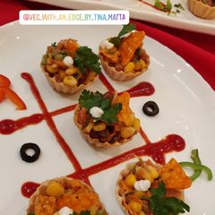 A picture of Mexican corn and bean chaat.