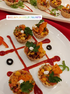 A picture of Mexican corn and bean chaat.
