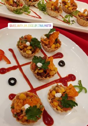 A picture of Mexican corn and bean chaat.