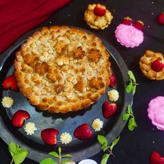 A picture of Apple pie with strawberry cream.