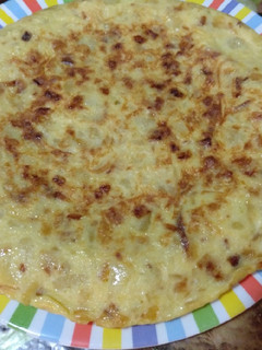 Una foto de Tortilla de patatas clásica con cebolla