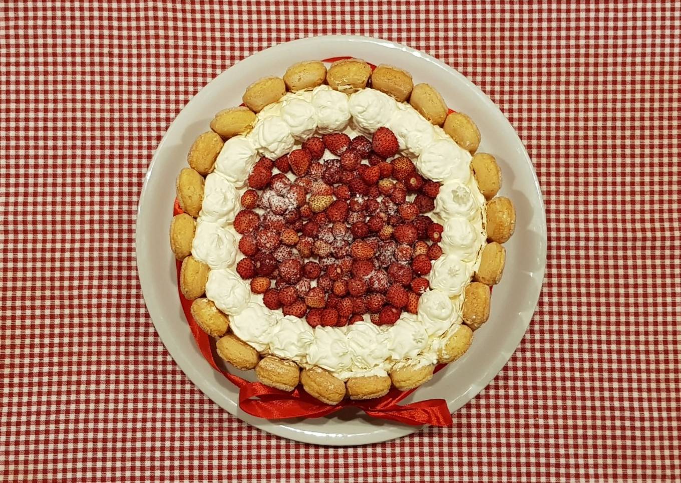 Charlotte with strawberries and strawberries