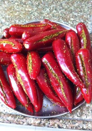 A picture of Stuffed red chillies.