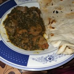 A picture of Lotus with spinach.