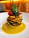 Abbraccio di tonnarelli colorati Gambero di Mazara,coulis di Carapace,pomodori colorati