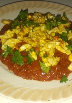 A picture of Butter egg mughlai.