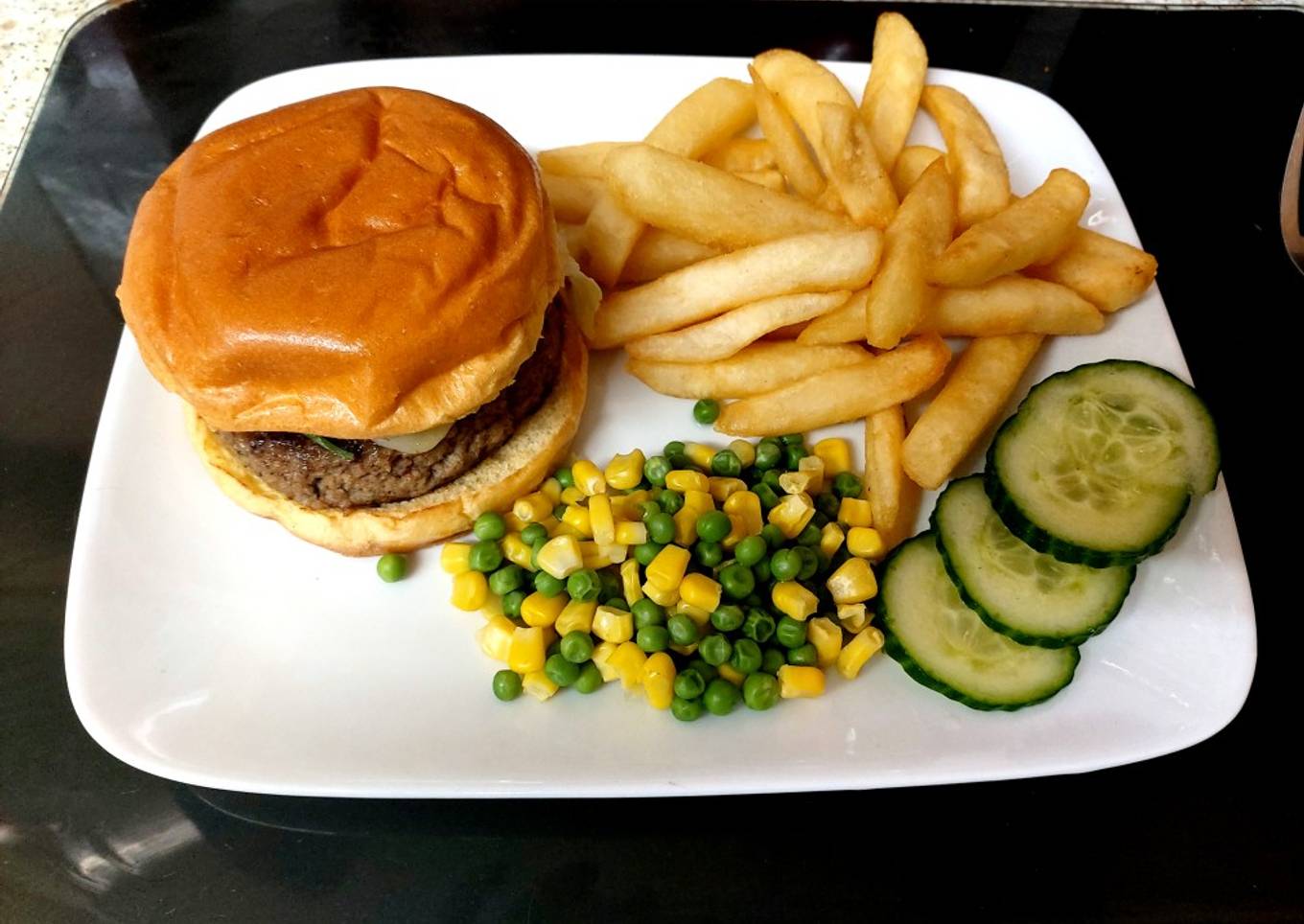 My Lamb + Mint Burger, with Soft cheese + chives on Brioche Buns