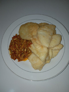 A picture of Fried Yam and side egg sauce.