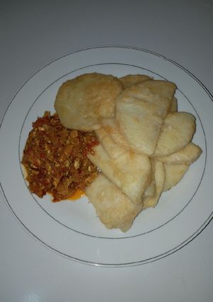 A picture of Fried Yam and side egg sauce.