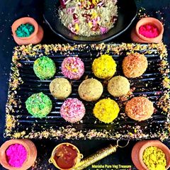 A picture of Colourful Coconut Thandai Ladoos - Holi Special.