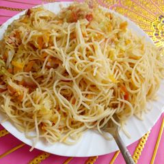 A picture of Spaghetti with steamed cabbage.