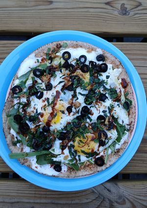 A picture of Not so Turkish eggs on flatbread.