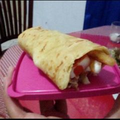 A picture of Chicken Shawarma/Chicken Wrap with French Fries.