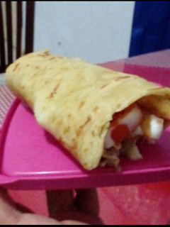 A picture of Chicken Shawarma/Chicken Wrap with French Fries.