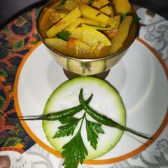 A picture of Bottle gourd and potatoes gravy.