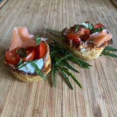 A picture of 'Tato Pots with Sinodun Hill, Soused Tomatoes and Smoked Salmon.