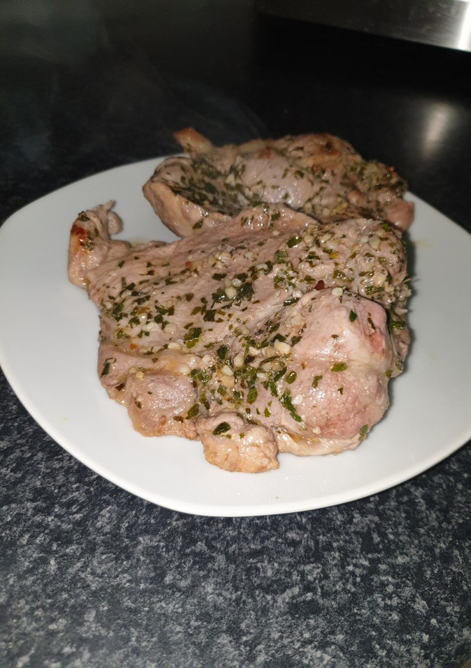 Una foto de Chuletas con ajito
