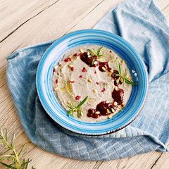 A picture of Cauliflower soup with raspberry sauce and truffle oil 🤤.