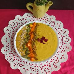 A picture of Healthy Mango Oats Dryfruit Smoothie Bowl.