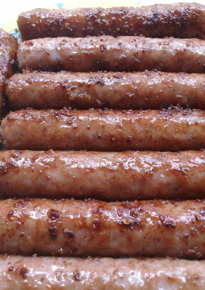 Una foto de Salchichas frescas fritas con vinagre de módena