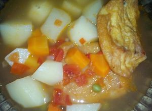 Una foto de Pescado forrado en su jugo