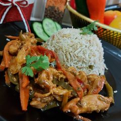 Fried rice with chicken chilli in my style A picture of Fried rice with chicken chilli in my style.