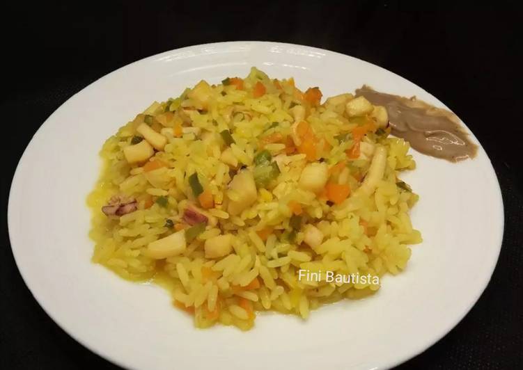 Arroz con calamares y alioli negro