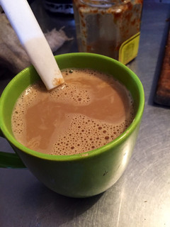 Una foto de Café con leche y dulce de leche