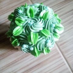 A picture of Frosted sponge cupcake.