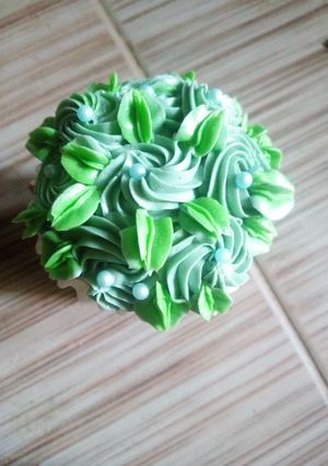 A picture of Frosted sponge cupcake.