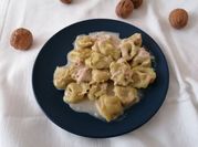 Una foto di pasta rucola