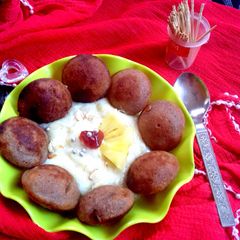 Choco paniyaram with pineapple rabdi A picture of Choco paniyaram with pineapple rabdi.