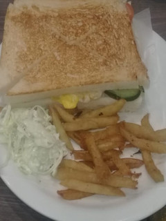 A picture of Sandwich with fries.
