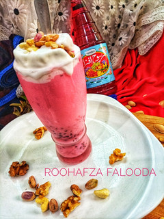 A picture of Three layered RoohAfza Ice cream Falooda.