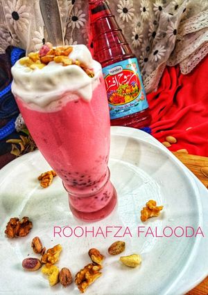 A picture of Three layered RoohAfza Ice cream Falooda.