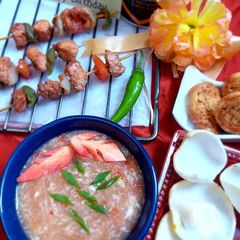 Hot n sour soup with shashlik sticks A picture of Hot n sour soup with shashlik sticks.