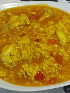 Una foto de Arroz caldoso con pollo