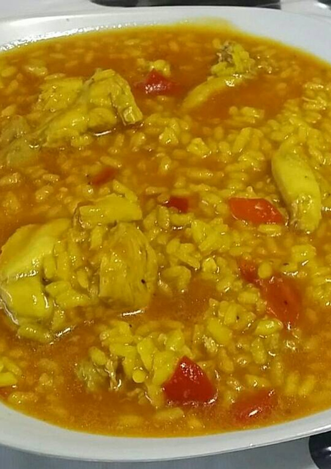 Una foto de Arroz caldoso con pollo