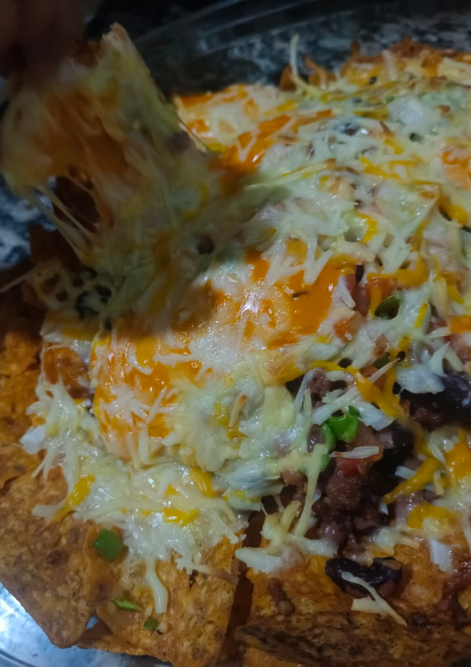 Una foto de Nachos mexicanos 🇲🇽 (no picantes para niños)
