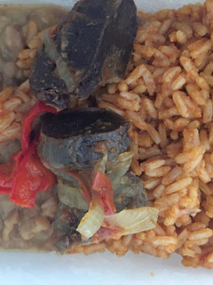 A picture of Jollof rice with porriage beans.